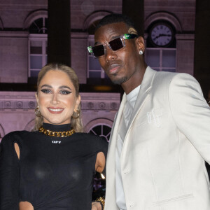 Paul Pogba et sa femme Maria Zulay Salaues - Arrivées et sorties du défilé Off-White Femme Automne/hiver 2022/2023 au palais Brongniart à Paris, France © Jeremy Melloul / Bestimage