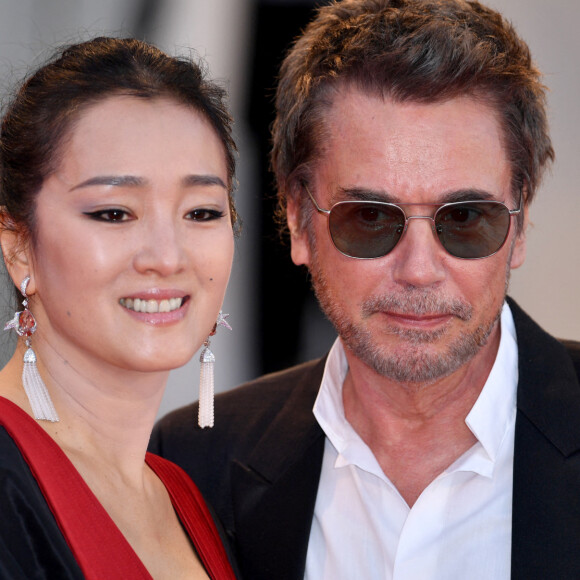 Jean-Michel Jarre et sa compagne Gong Li Jarre à la première du film "Saturday Fiction (Lan xin da ju yuan)" lors du 76ème festival du film de Venise, la Mostra, sur le Lido de Venise, Italie, le 4 septembre 2019. 