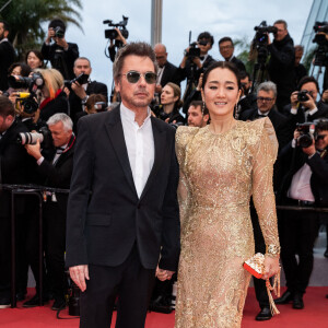Jean-Michel Jarre et sa compagne Gong Li (robe Elie Saab)- Montée des marches du film "Douleur et Gloire" lors du 72ème Festival International du Film de Cannes. Le 17 mai 2019 © Borde / Bestimage 