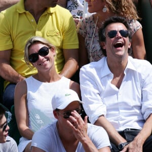 Archives - Anne-Sophie Lapix et son compagnon Arthur Sadoun lors du tournoi de tennis de Roland Garros à Paris, le 5 juin 2010.