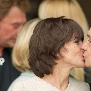 Michel Sardou et Anne-Marie Périer pour leur mariage en 1999 à Neuilly sur Seine