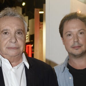 Michel Sardou et Davy Sardou - Enregistrement de l'émission " Vivement Dimanche " Spéciale Les enfants du Top 50, le 8 octobre 2014. L'émission sera diffusée le 12 Octobre 2014.