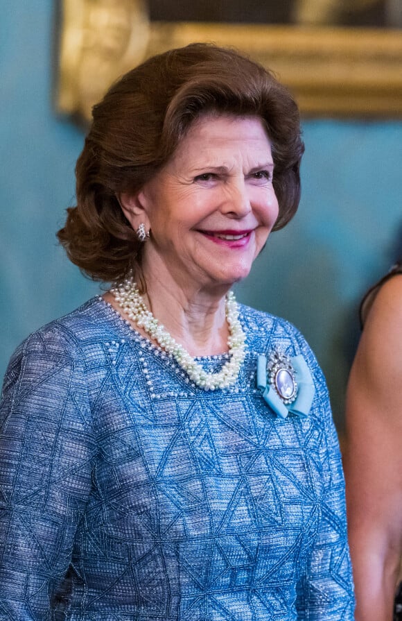 La reine Silvia de Suède, lors du dîner de gala annuel "Sverigemiddagen (dîner suédois)", suivi d'un concert dans la salle Rikssalen du palais royal à Stockholm, le 20 janvier 2023.