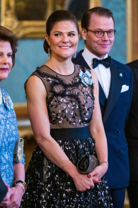 La princesse Victoria de Suède, Le prince Daniel de Suède, lors du dîner de gala annuel "Sverigemiddagen (dîner suédois)", suivi d'un concert dans la salle Rikssalen du palais royal à Stockholm, le 20 janvier 2023.