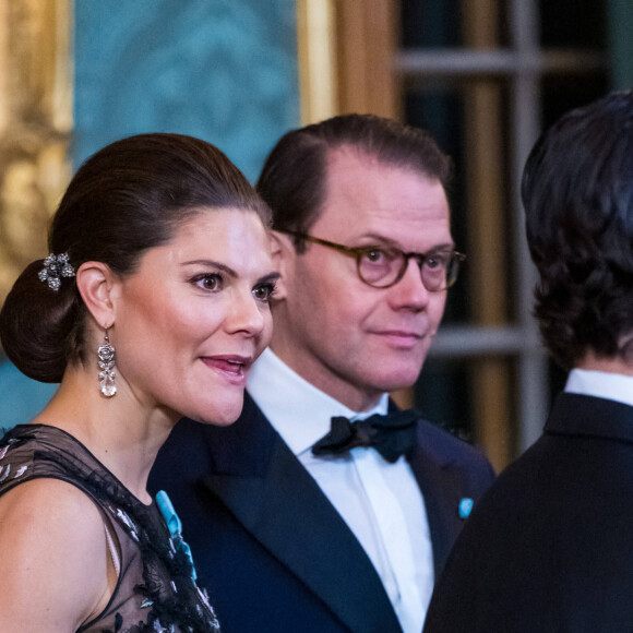 La princesse Victoria de Suède, Le prince Daniel de Suède, lors du dîner de gala annuel "Sverigemiddagen (dîner suédois)", suivi d'un concert dans la salle Rikssalen du palais royal à Stockholm, le 20 janvier 2023.