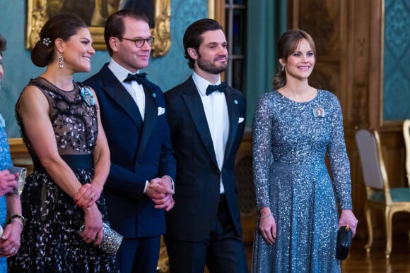 La princesse Victoria de Suède, Le prince Daniel de Suède, La princesse Sofia (Hellqvist) de Suède, Le prince Carl Philip de Suède, lors du dîner de gala annuel "Sverigemiddagen (dîner suédois)", suivi d'un concert dans la salle Rikssalen du palais royal à Stockholm, le 20 janvier 2023.