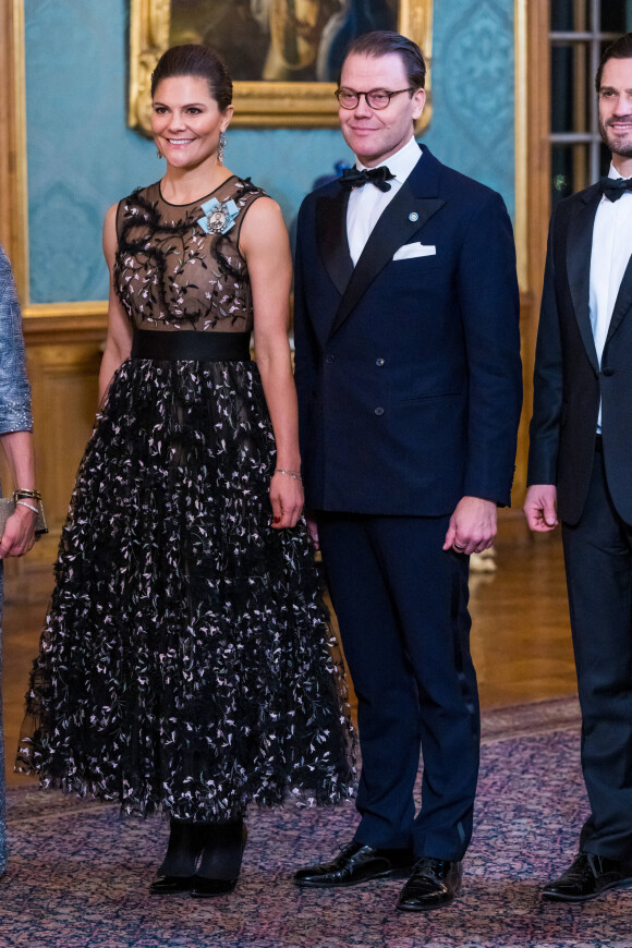 La princesse Victoria de Suède, Le prince Daniel de Suède, lors du dîner de gala annuel "Sverigemiddagen (dîner suédois)", suivi d'un concert dans la salle Rikssalen du palais royal à Stockholm, le 20 janvier 2023.