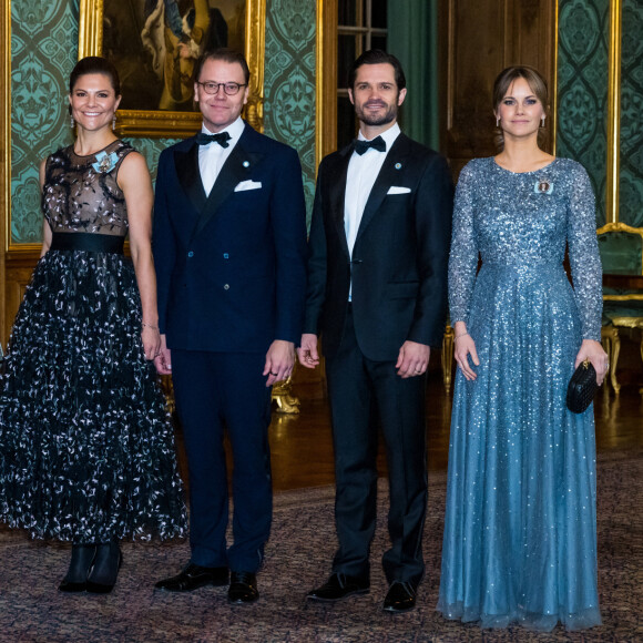 La princesse Victoria de Suède, Le prince Daniel de Suède, La princesse Sofia (Hellqvist) de Suède, Le prince Carl Philip de Suède, lors du dîner de gala annuel "Sverigemiddagen (dîner suédois)", suivi d'un concert dans la salle Rikssalen du palais royal à Stockholm.