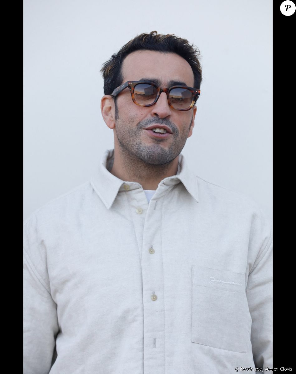 Jonathan Cohen - Les célébrités au photocall du défilé Jacquemus pour la présentatation de la toute dernière collection "Le Raphia" au Bourget, Seine-Saint-Denis (93), France, le 12 décembre 2022. © Veeren-Clovis/Bestimage .