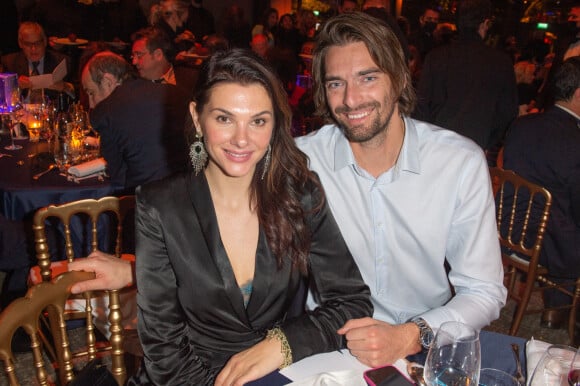 Exclusif - Le nageur Camille Lacourt et sa compagne Alice Detollenaere lors de la soirée de gala de l'Institut Rafaël, maison de l'après Cancer, au Pavillon Gabriel à Paris le 13 décembre 2021. © Erez Lichtfeld / Bestimage