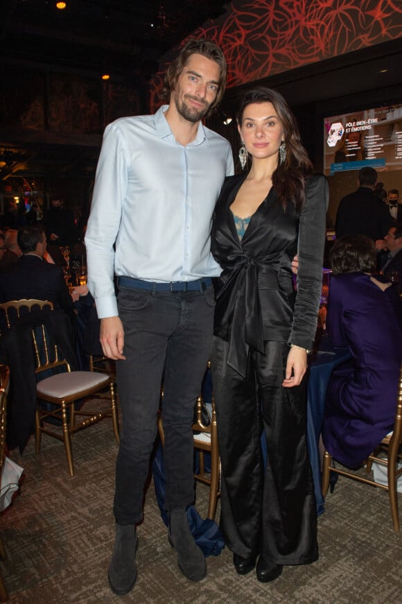 Exclusif - Le nageur Camille Lacourt et sa compagne Alice Detollenaere lors de la soirée de gala de l'Institut Rafaël, maison de l'après Cancer, au Pavillon Gabriel à Paris le 13 décembre 2021. © Erez Lichtfeld / Bestimage