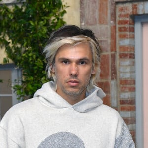 Orelsan (Aurélien Cotentin) au front row du défilé de mode Homme printemps-été 2023 Dior à l'école du Val de Grâce à Paris, France, le 24 juin 2022. © Veeren-Clovis/Bestimage 