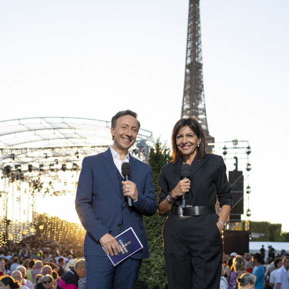 Exclusif - Stéphane Bern (Chaussures Louboutin aux couleurs Bleu Blanc Rouge) et Anne Hildalgo - Enregistrement de l'émission "Le concert de Paris" à la Tour Eiffel pour le 14 Juillet à Paris, diffusé sur France 2 © Pierre Perusseau-Tiziano da Silva / Bestimage 