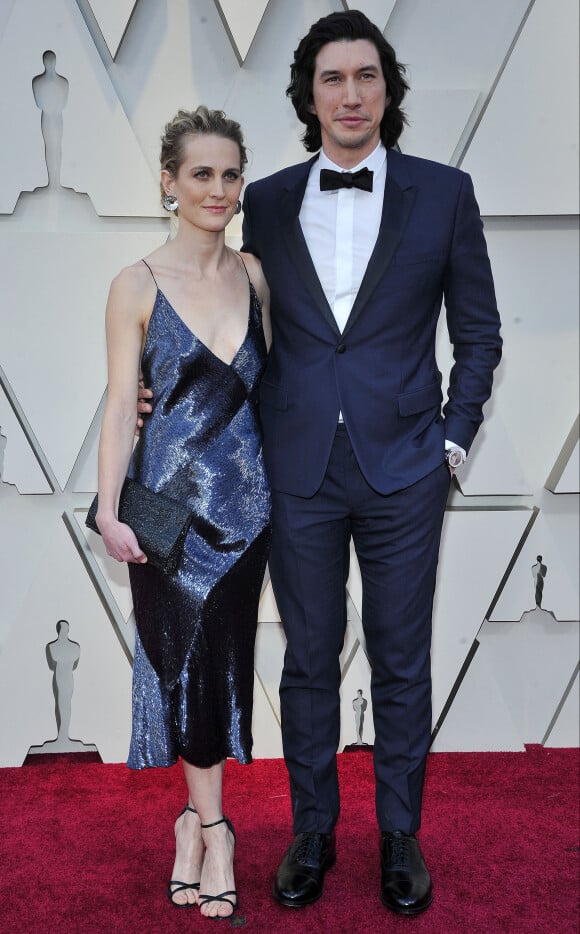 Joanne Tucker et son mari Adam Driver lors du photocall des arrivées de la 91ème cérémonie des Oscars 2019 au théâtre Dolby à Hollywood, Los Angeles, Californie, Etats-Unis, le 24 février 2019.