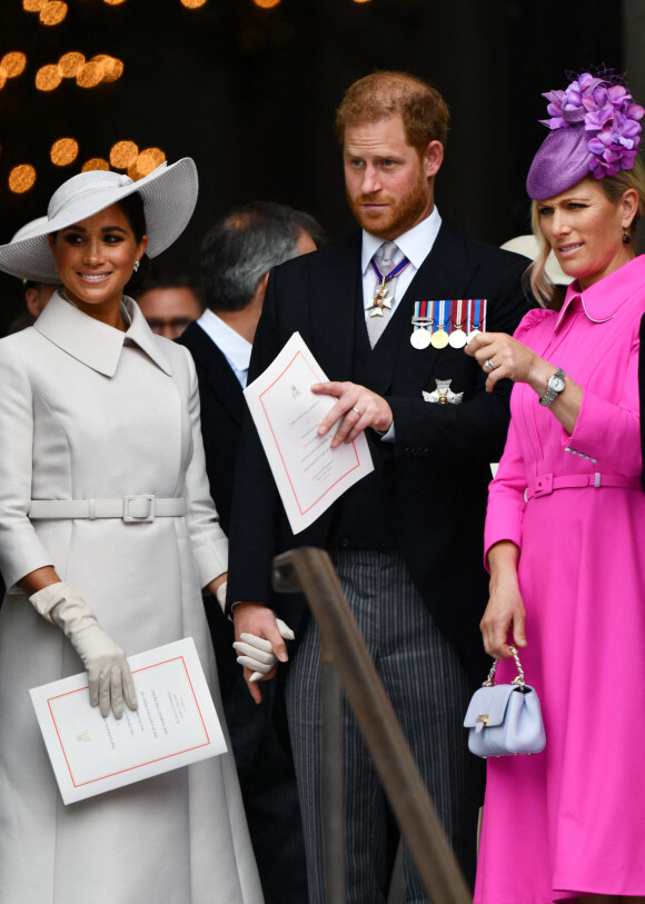 Le prince Harry, duc de Sussex, et Meghan Markle, duchesse de Sussex, Zara Tindall - Les membres de la famille royale et les invités lors de la messe célébrée à la cathédrale Saint-Paul de Londres, dans le cadre du jubilé de platine (70 ans de règne) de la reine Elisabeth II d'Angleterre. Londres, le 3 juin 2022. 