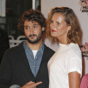 Jérémy Frérot et Florent Manaudou s'affrontent dans un petit jeu, sous l'oeil amusé de Laure Manaudou.
Laure Manaudou et son compagnon Jérémy Frérot - Arrivées à la 17ème cérémonie des NRJ Music Awards au Palais des Festivals à Cannes. © Christophe Aubert via Bestimage