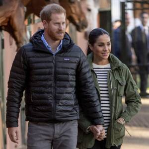 Le prince Harry, duc de Sussex et Meghan Markle (enceinte), duchesse de Sussex en visite à la Fédération Royale Marocaine de Sports Equestres à Rabat, lors de leur voyage officiel au Maroc. Le 25 février 2019 