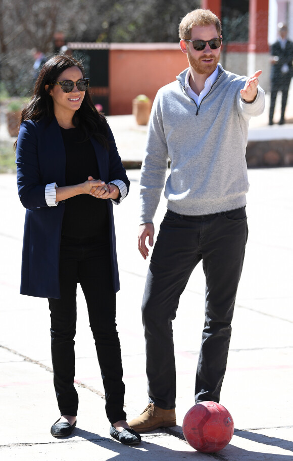 Le prince Harry, duc de Sussex, et Meghan Markle, duchesse de Sussex, enceinte visitent le "Lycée Qualifiant Grand Atlas"à Asni, dans le cadre de leur voyage officiel au Maroc, le 24 février 2019. 