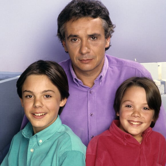 Archives - En France, à Paris, rendez-vous avec Michel Sardou et ses deux fils, Romain, 13 ans et Davy, 9 ans. Novembre 1987 © Michel Marizy via Bestimage