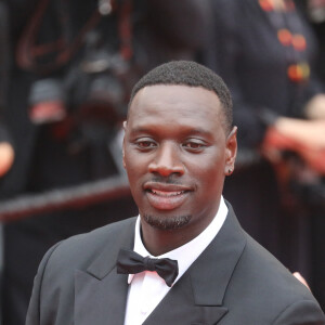 Omar Sy - Montée des marches du film " Top Gun : Maverick " lors du 75ème Festival International du Film de Cannes. Le 18 mai 2022 © Dominique Jacovides / Bestimage 
