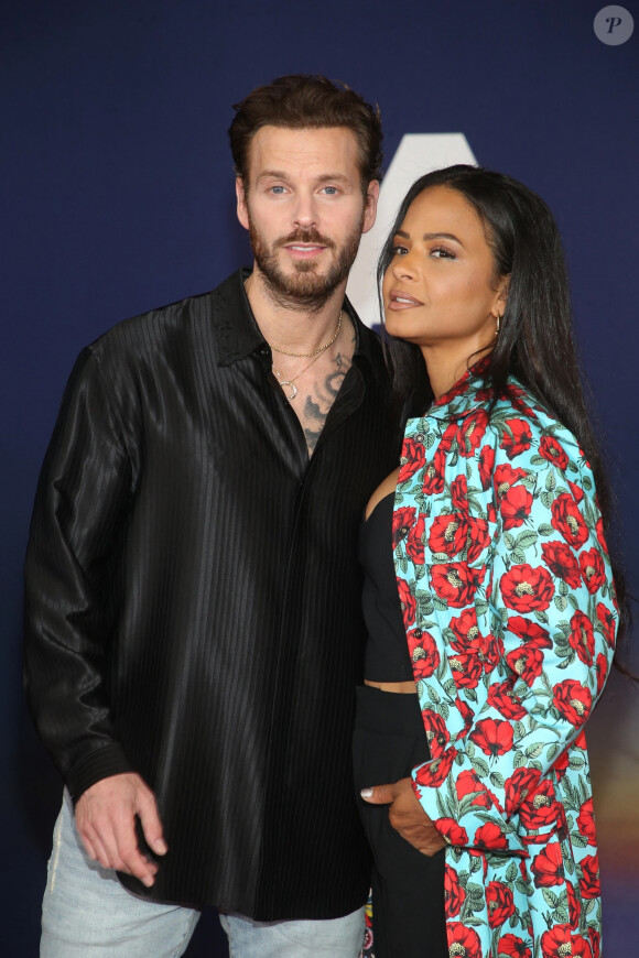 Matt Pokora et sa femme Christina Milian - Photocall lors de la première du film "Ambulance" à Los Angeles le 4 avril 2022.