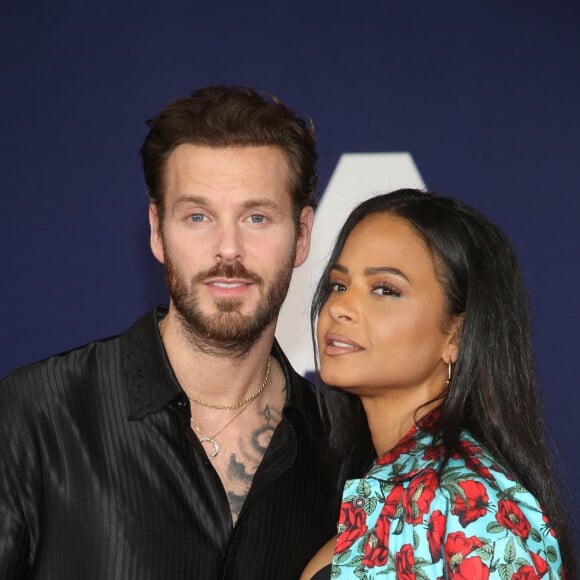 Matt Pokora et sa femme Christina Milian - Photocall lors de la première du film "Ambulance" à Los Angeles le 4 avril 2022.