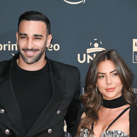 Adil Rami et Léna Guillou toujours en couple ? L'influenceuse répond
 
Adil Rami et sa compagne Léna Guillou - Photocall de la cérémonie des Trophées UNFP au Pavillon Gabriel à Paris. © Coadic Guirec/Bestimage