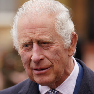 Le roi Charles III d'Angleterre assiste au début de l'Australian Legacy Torch Relay au palais de Buckingham à Londres, le 28 avril 2024. Cela marque le début de l'étape londonienne de la course de relais de l'organisme de bienfaisance qui célèbre son centenaire. 