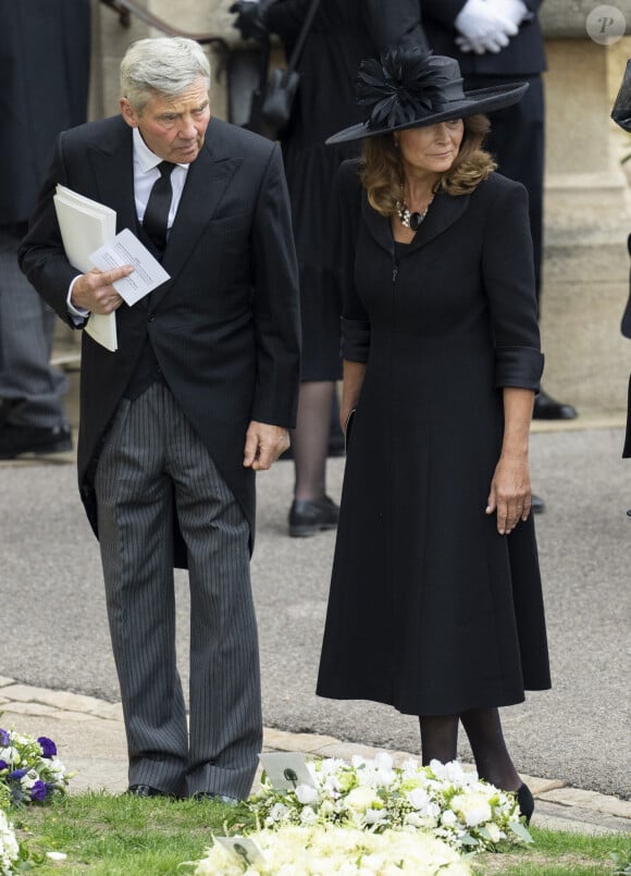 Michael et Carole Middleton - Procession pédestre des membres de la famille royale depuis la grande cour du château de Windsor (le Quadrangle) jusqu'à la Chapelle Saint-Georges, où se tiendra la cérémonie funèbre des funérailles d'Etat de reine Elizabeth II d'Angleterre. Windsor, le 19 septembre 2022