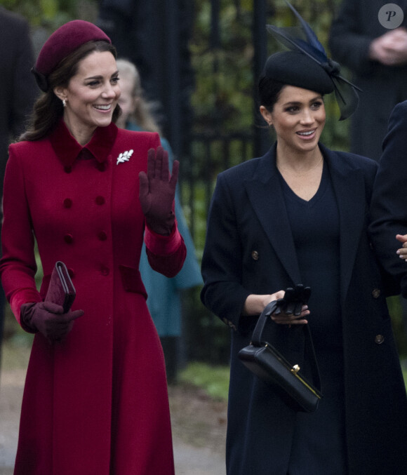 Meghan Markle, quant à elle, est dans les dernières du classement. 
Catherine Kate Middleton, la duchesse de Cambridge et Meghan Markle, la duchesse de Sussex enceinte - La famille royale britannique se rend à la messe de Noël à l'église Sainte-Marie-Madeleine à Sandringham, le 25 décembre 2018. 