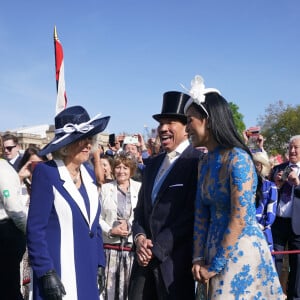 Le chanteur a rencontré la reine consort... et brisé le protocole ! 
La reine consort Camilla Parker Bowles, Lionel Richie et sa compagne Lisa Parigi - Garden Party au palais de Buckingham à Londres. Le 3 mai 2023 