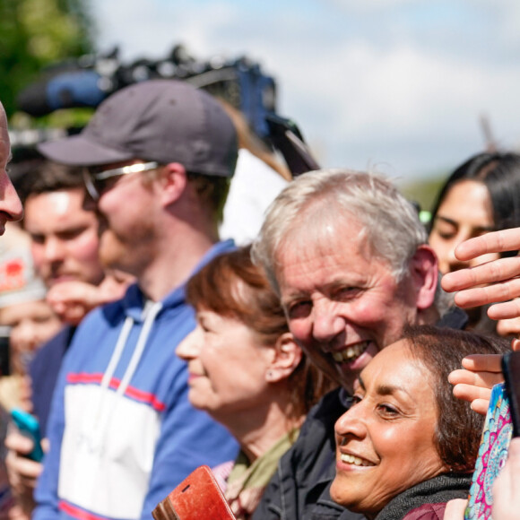 Le prince William, prince de Galles, et Catherine (Kate) Middleton, princesse de Galles, à la rencontre du public du concert du couronnement près du château de Windsor Le prince William, prince de Galles - Le prince de Galles, et la princesse de Galles, à la rencontre du public du concert du couronnement près du château de Windsor, le 7 mai 2023. Au lendemain du sacre du roi d'Angleterre et de la reine consort, L.Richie, K.Perry et le groupe Take That, sans R.Williams, Andrea Bocelli seront quelques un des artistes à se produire sur scène pour fêter l'événement. 