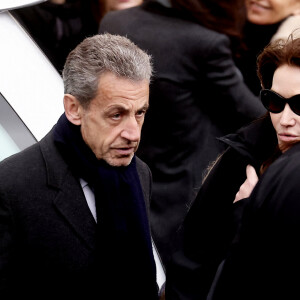 Nicolas Sarkozy et sa femme Carla Bruni-Sarkozy - Sorties des obsèques de Päl Sarkozy de Nagy Bocsa, le père de Nicolas Sarkozy, en l'église Saint-Jean Baptiste à Neuilly sur Seine le 9 mars 2023. © Dominique Jacovides / Bestimage 