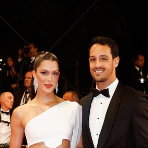 C'est avec son fiancé Diego El Glaoui qu'elle a fait le déplacement
Iris Mittenaere et son fiancé Diego El Glaoui - Montée des marches du film " Le retour (Homecoming) " lors du 76ème Festival International du Film de Cannes, au Palais des Festivals à Cannes. Le 17 mai 2023 © Christophe Clovis / Bestimage 