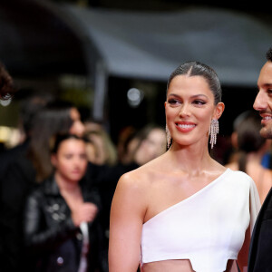 Iris Mittenaere et son fiancé Diego El Glaoui - Montée des marches du film " Le retour (Homecoming) " lors du 76ème Festival International du Film de Cannes, au Palais des Festivals à Cannes. Le 17 mai 2023 © Jacovides-Moreau / Bestimage 