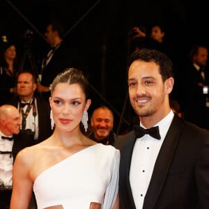 Iris Mittenaere et son fiancé Diego El Glaoui - Montée des marches du film " Le retour (Homecoming) " lors du 76ème Festival International du Film de Cannes, au Palais des Festivals à Cannes. Le 17 mai 2023 © Christophe Clovis / Bestimage 