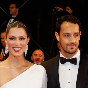 Iris Mittenaere et son fiancé Diego El Glaoui - Montée des marches du film " Le retour (Homecoming) " lors du 76ème Festival International du Film de Cannes, au Palais des Festivals à Cannes. Le 17 mai 2023 © Christophe Clovis / Bestimage 