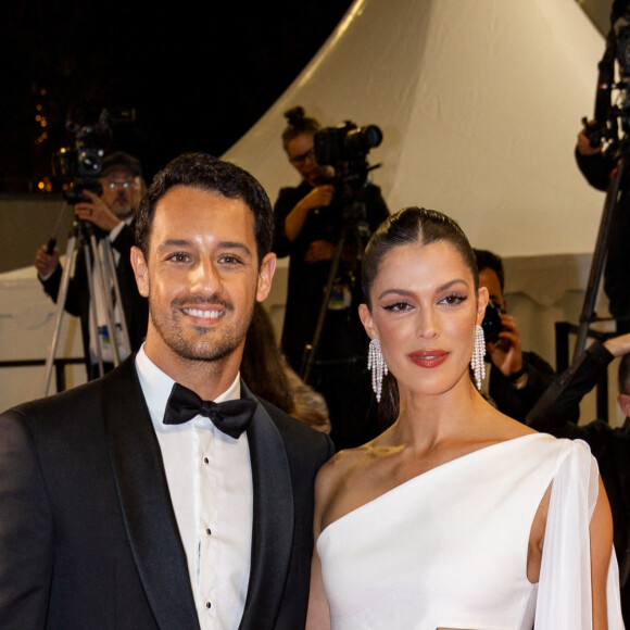 Iris Mittenaere et son fiancé Diego El Glaoui - Montée des marches du film " Le retour (Homecoming) " lors du 76ème Festival International du Film de Cannes, au Palais des Festivals à Cannes. Le 17 mai 2023 © Jacovides-Moreau / Bestimage 