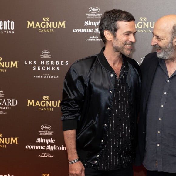 Romain Duris, Cédric Klapisch - Soirée sur la plage Magnum lors du 76ème Festival International du Film de Cannes le 18 mai 2023. © Jeremy Melloul/Bestimage