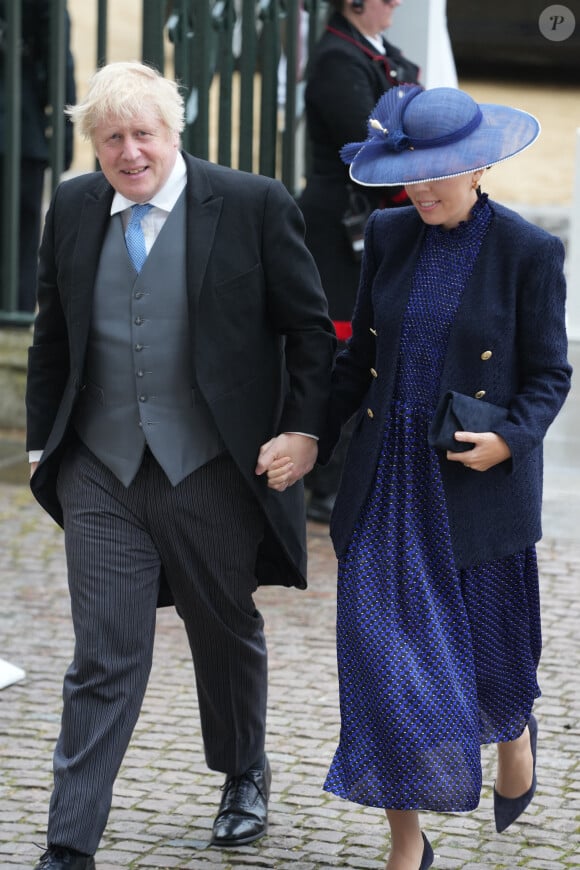 Lors de sa venue au couronnement de Charles III, Carrie Johnson dissimulait discrètement ses premières rondeurs de grossesse
L'ancien Premier ministre Boris Johnson et sa femme Carrie Johnson - Les invités arrivent à la cérémonie de couronnement du roi d'Angleterre à l'abbaye de Westminster de Londres, Royaume Uni, le 6 mai 2023.
