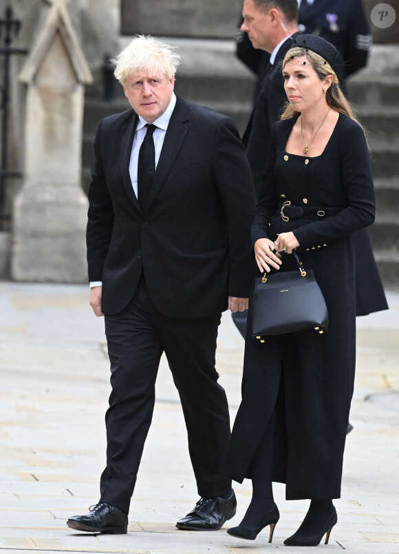 Boris Johnson et sa femme Carrie - Arrivées au service funéraire à l'Abbaye de Westminster pour les funérailles d'Etat de la reine Elizabeth II d'Angleterre. Le sermon est délivré par l'archevêque de Canterbury Justin Welby (chef spirituel de l'Eglise anglicane) au côté du doyen de Westminster David Hoyle. Londres, le 19 septembre 2022.