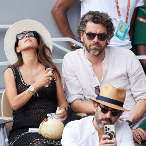 Ils ont déjà un petit garcon ensemble, né en juin 2019.
Reem Kherici, enceinte, et son mari Gilles Lemaire dans les tribunes lors des Internationaux de France de Tennis de Roland Garros 2023. Paris, le 7 juin 2023. © Jacovides / Moreau / Bestimage 