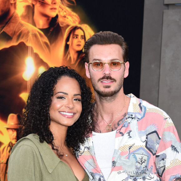 Christina Milian et son mari M Pokora (Matt Pokora) à la première du film "Jurassic World Dominion" à Los Angeles, le 6 juin 2022. 