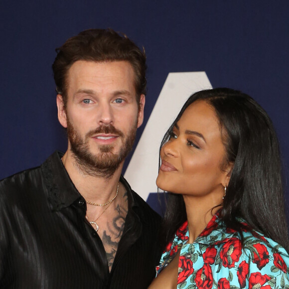 Matt Pokora et sa femme Christina Milian au photocall lors de la première du film "Ambulance" à Los Angeles le 4 avril 2022. 