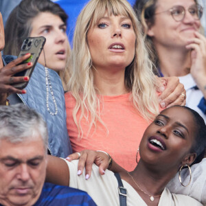 Nagui et sa femme Melanie Page - Célébrités dans les tribunes du match de football entre la France et la Grèce au Stade de France dans le cadre des éliminatoires pour l'Euro 2024, le 19 juin 2023. © Cyril Moreau/Bestimage