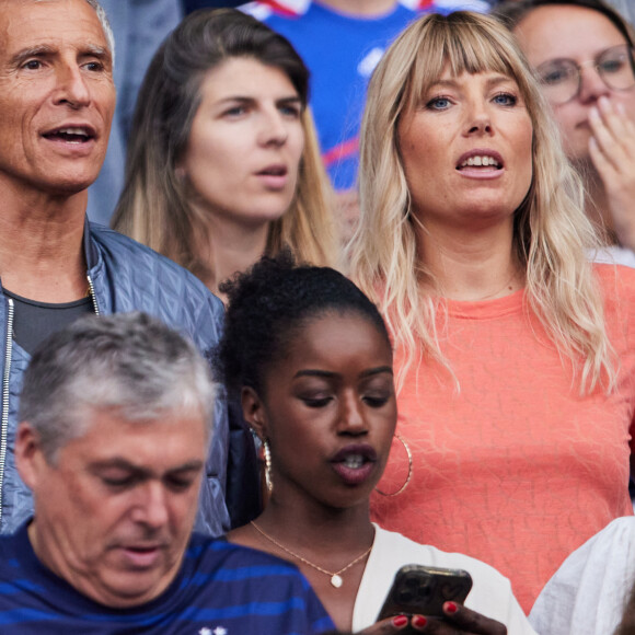 Nagui et sa femme Melanie Page - Célébrités dans les tribunes du match de football entre la France et la Grèce au Stade de France dans le cadre des éliminatoires pour l'Euro 2024, le 19 juin 2023. © Cyril Moreau/Bestimage