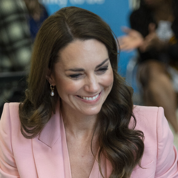 Catherine (Kate) Middleton, princesse de Galles, lors d'une visite à la Saint Pancras Community Association dans le quartier de Camden à Londres, Royaume Uni, le 25 mai 2023.
