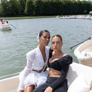 Tina Kunakey et Adèle Exarchopoulos au front row dans une barque pour le défilé Jacquemus collection "Le chouchou" automne-hiver 2023/2024, même si la marque est désormais déconnectée du traditionnel calendrier de la mode et livre des collections qui ne sont plus liées aux saisons, au château de Versailles, France, le 26 juin 2023. © Olivier Borde/Bestimage