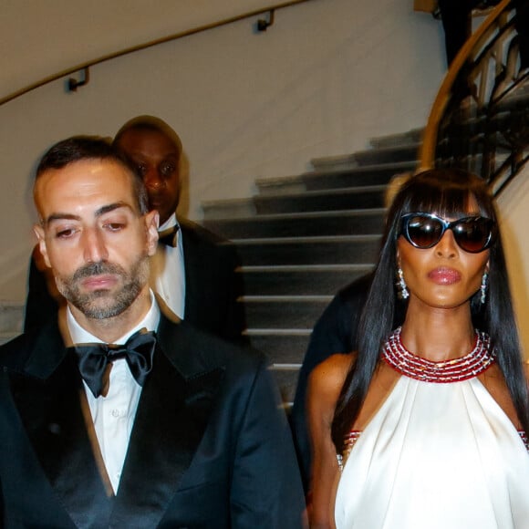 Mohammed Al Turki et Naomi Campbell à la sortie de l'hôtel "Martinez" lors du 76ème Festival International du Film de Cannes, France, le 22 mai 2023. 