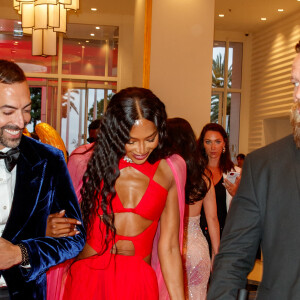 Mohammed Al Turki et Naomi Campbell - Les célébrités à la sortie de l'hôtel "Martinez" lors du 76ème Festival International du Film de Cannes, France, le 20 mai 2023. 